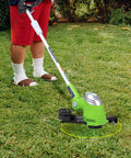 Green trimmer with Weed Eater Spools Replacement For Greenworks Trimmers 20V 24V 40V 16 Ft 0.065 Inch Line in use on lawn