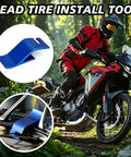 All-In-One Motorcycle Tire Changing Tool Kit with bead holders, rim protectors, on a red motorcycle in a forest setting