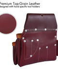 Close up of maroon leather tool pouch from Leather Tool Belt For Men Heavy Duty Work Belt With 19 Pockets And 2 Pouches Double Hammer Holder Foam Padded Belt With Suspender Loops A Real Workhorse For Framers And Electricians, showing pocket design and rivets.