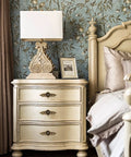 Bedroom scene with cream dresser, fitted with Three Pack Euro Rose Cabinet Knobs With Backplate Vintage Zinc Alloy Flower Drawer Pulls Bronze Finish.
