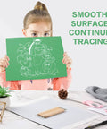 Child holding drawing traced with 50 Sheets Carbon Paper Graphite Transfer Paper 8.5 By 11.5 Inch Tracing Paper Kit With 5 Embossing Styluses