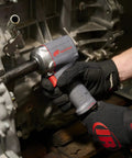 Person using Half Inch Air Impact Wrench With Quiet Technology Up To 650 Foot Pounds Of Torque Ultra Compact And Light