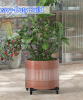 Expandable Heavy Duty Plant Caddy Wheel Base 21 To 30 Inch Rolling Dolly Stand Built Tough Steel Frame outdoors with plants.