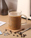 Lab Week Chemistry Gift Set Caffeine Beaker Coffee Mug With Metal Spoon Keychain Greeting Card And Gift Box on table