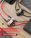 Heavy Duty 12 Volt 100 Amp Power Distribution Block With Dual Quarter Inch M6 Stud Busbar crafted rugged, wiring connections on display.