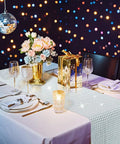 Disco Table Runner Set Of 5 Glitter Silver Sequin Runners For Party Wedding Decor 12 X 72 Inches on table with flowers and gifts
