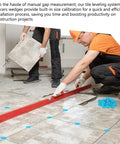 Blue cross ceramic tile spacers and red leveling bar on tiled floor during installation.