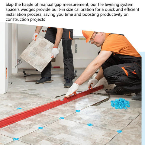 Blue cross ceramic tile spacers and red leveling bar on tiled floor during installation.