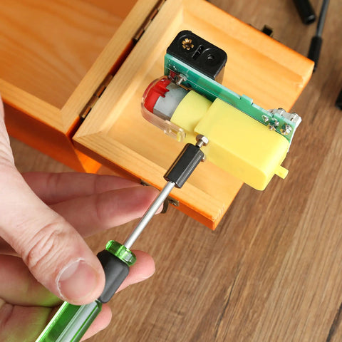 Using 7 Piece Precision Nut Driver Set Green And Black Metric 3 To 6 mm Nut Drivers for Electronics with Swivel End Caps