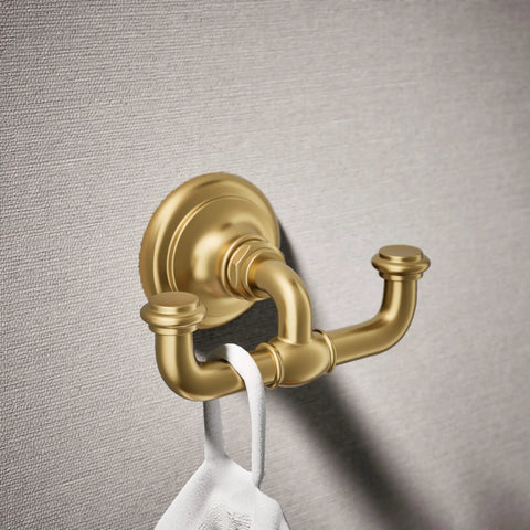 Artifacts Double Robe Hook In Vibrant Brushed Moderne Brass for Bathroom Storage mounted on wall holding towel