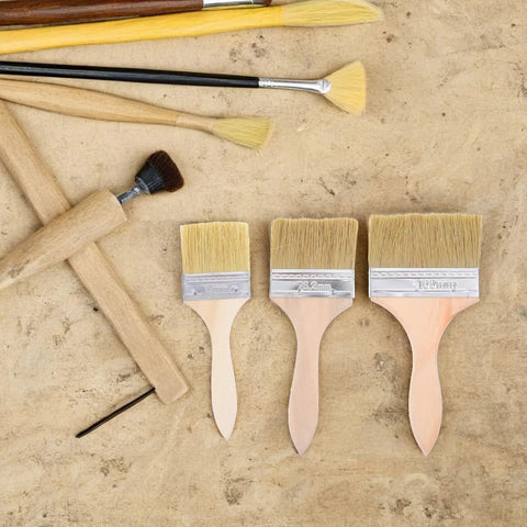 Do It All Three Piece Wood Handle Paint Brush Set With Natural Bristle For Walls, Furniture, Decks And Stain Jobs on wood surface