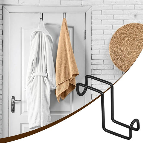 Two Pack 4 Inch Heavy Duty Tack Hooks Over Rail Bridle Rack on a door holding robes and towels