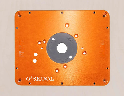 Router Table Insert Plate Template Kit With MDF Routing Template And Threaded Inserts Plus Router Bits For 9-1/4 x 11-3/4 Standard Plates RTS020 shown in orange metal with measurement markings.