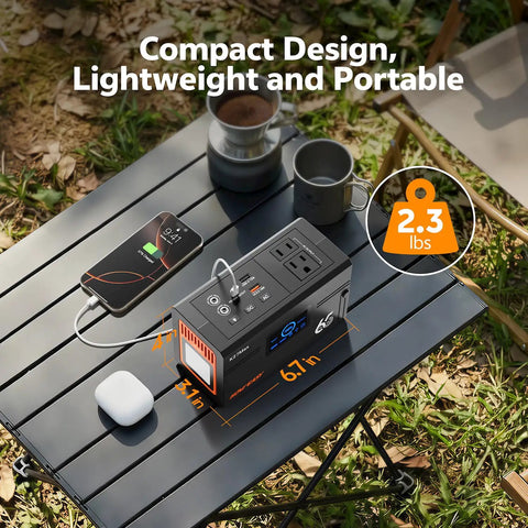 Slick Portable Power Station Delivering 135W Steady And 270W Peak Surge on a table with phone charging, weighs 2.3 lbs, compact design.