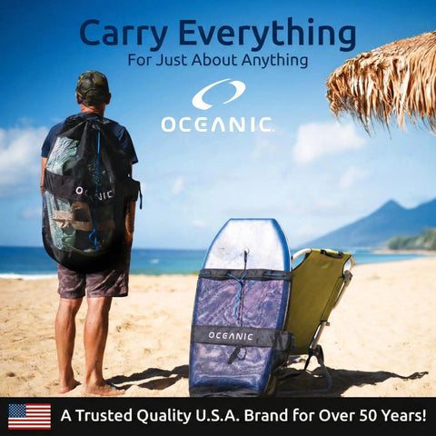 Person on beach with XL Mesh Dive Bag Backpack for Snorkel Gear. Lightweight, quick dry, padded straps, internal pocket, fits fins and wetsuit.