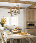 Four-Light Farmhouse Chandelier With Imitation Wood Grain And Matte Black Finish above rustic kitchen table setting