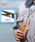 All In One Fishing Tool Set With Corrosion Resistant Pliers Fillet Knife Scissors Lip Gripper And Multi Functional Jaw For Freshwater Bass Angling A Great Gift For Men 4.5 inch scissors in hand showing non-slip elastomer handle and lanyard