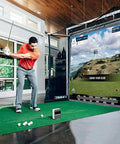 Indoor Golf Simulator Setup For Home And Commercial Use, Four Size Options, Includes HD Impact Screen, Compatible With All Golf Launch Monitors For Realistic Practice And Training showing a man golfing with realistic scenery.