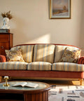 Living room sofa with striped cushions and 6 Inch Wooden Furniture Legs Bun Feet Set Of 4 With M8 Bolt Recessed Mounting.