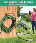 Heavy Duty Garden Hose Holder Wall Mount For Outdoor Yard And Garage Holds 150 Feet Of Hoses Durable Bronze Metal Weather Resistant Hose Reel Hanger And Storage Solution mounted on wooden wall with green hose