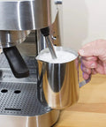 Making foam milk with Stainless Steel Espresso And Coffee Maker Duo Brew Kit With 10 Cup Capacity 19 Bar ULKA Pump 1250 Watt Power Die Cast Aluminum Filter Holder.
