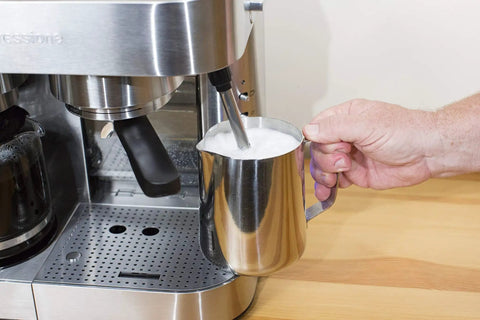 Making foam milk with Stainless Steel Espresso And Coffee Maker Duo Brew Kit With 10 Cup Capacity 19 Bar ULKA Pump 1250 Watt Power Die Cast Aluminum Filter Holder.