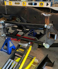 Universal Four Link Suspension Kit With Adjustable Bars And Panhard Bar For Custom Builds Ride Ready Includes Weld On Mounts 24 Inch Steel Link Bars Axle And Frame Brackets Center Link Mounts installed on rear frame