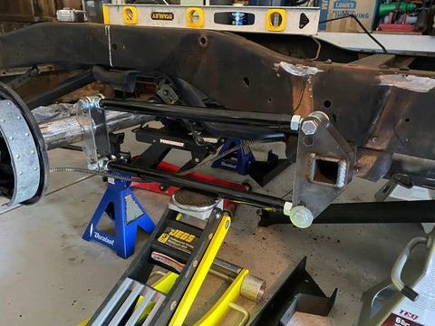 Universal Four Link Suspension Kit With Adjustable Bars And Panhard Bar For Custom Builds Ride Ready Includes Weld On Mounts 24 Inch Steel Link Bars Axle And Frame Brackets Center Link Mounts installed on rear frame