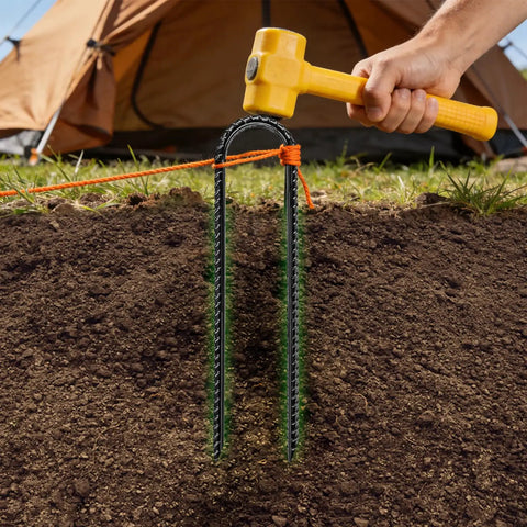 Inserting Beefy 8 Inch U Shaped Ground Anchor Stakes, 10 Pack Galvanized Rebar Stakes for tent, using a hammer for windy days