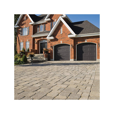 Brick house with paved driveway showcasing the effect of Multi Surface Waterproof Stain And Sealer For Exterior Wood, Concrete And Brick Clear Finish, 12 Oz Aerosol Can For Easy DIY Outdoor Protection And Waterproofing