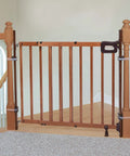 Banister To Banister Gate Mounting Kit For Round Or Square Banisters Up To 37 Inches Tall installed on wooden staircase