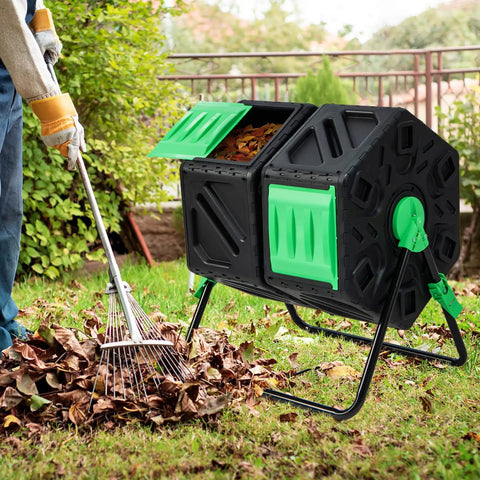 Dual Chamber Compost Tumbler with 34.5 Gallon Capacity, outdoor rotating composter with aeration and two sliding doors in garden