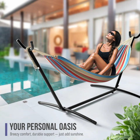 Two Person Luxury Hammock With Steel Stand Portable 450 Lbs Capacity Cotton Blend 60 Inch Bed by a pool