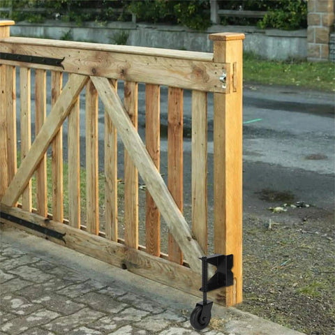 Heavy Duty Spring Loaded Gate Caster Wheel With 360 Degree Swivel And Universal Mount Plate Leveling Bracket attached to wooden gate