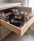 Heavy Duty Pull Out Cabinet Drawer Made From Solid 9 Ply Baltic Birch With Dovetail Joints filled with pots and pans.