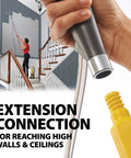 Person using Smart Sidekick Workhorse Power Paint Roller Direct Feed System on high wall to reach ceiling.