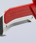 Close-up of Workhorse Pro Grade 1000V Insulated Dismantling Knife With Fixed Hook Sickle Blade Guide Shoe, red handle, Germany.