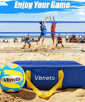 Backyard Volleyball Net Set With Pro Grade Sturdy Winch displayed on beach with volleyball and carry bag.