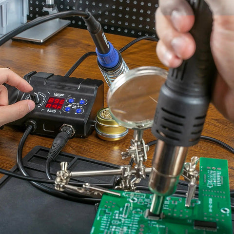 All In One Pro Grade Soldering Iron Station And Hot Air Rework System With Precision Temperature Control in use on circuit board