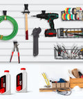 Heavy-Duty Slatwall Baskets and Hooks Kit for Standard Slatwall Panels, 32-piece set with tools organized in garage workshop.