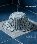 Bathtub Drain Strainer Silicone Bathroom Stopper Fixture in use, capturing hair while water flows through on tiled floor.
