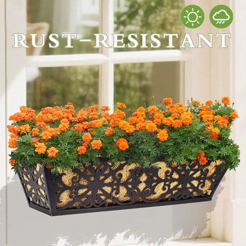 Black 24 inch window box planter with rust-resistant frame and coco liner, filled with orange flowers, mounted on window.