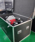 Open storage case with equipment for Workhorse Crop Sprayer Drone With 8 Gallon Payload For Granule Spreading And Seed Sowing.