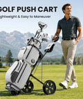 Top Shelf Two Wheel Golf Pull Cart Lightweight Foldable Push Cart Built From Heavy Duty Steel With Quick Adjust Straps Providing Smooth Glide Action And Rock Solid Frame Support For Weekend Warriors Enjoying The Sport on a golf course.