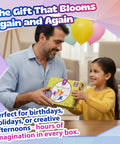 Father and daughter exchanging an Origami Paper Craft Kit For Kids Ages 6 To 12 With 100 Colored Sheets, 20 Bendable Stems at a table