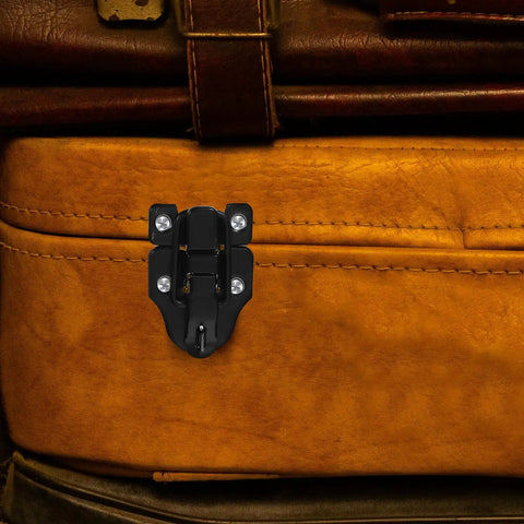 Retro Metal Toggle Hasp Latch Set With Lock Hole 6 Pack For Wooden And Metal Boxes on leather suitcase close-up