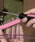 Close-up of screwdriver handle with pink bits from 39 Piece Pink Household Tool Set With Storage Case For Home DIY Projects Includes Hammer Pliers Screwdrivers Tape Measure And More Durable Chrome Plated Tools For Quick Fixes And Everyday Repairs.