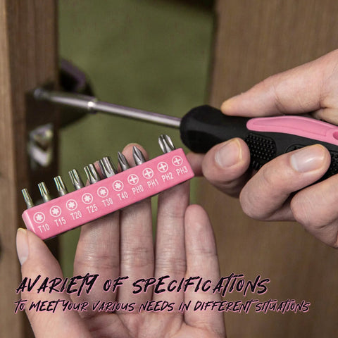 Close-up of screwdriver handle with pink bits from 39 Piece Pink Household Tool Set With Storage Case For Home DIY Projects Includes Hammer Pliers Screwdrivers Tape Measure And More Durable Chrome Plated Tools For Quick Fixes And Everyday Repairs.
