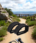 2 Pack Black Pedal Straps For Fixed Gear And Kids Bikes With Toe Clips Tape Durable Nylon displayed on a scenic trail.