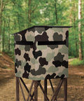 Camouflaged hunting blind with Specialty Camouflage Paint Quart Flat Army Green Water Based Non Reflective Finish